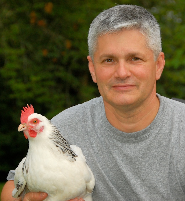 Tim Delaney and Fanny, the Light Sussex hen